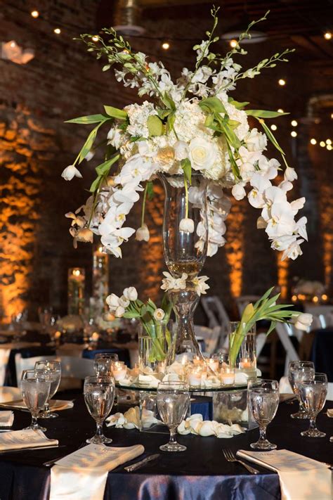 Modern White Orchid Cascade Centerpieces | White wedding centerpieces ...