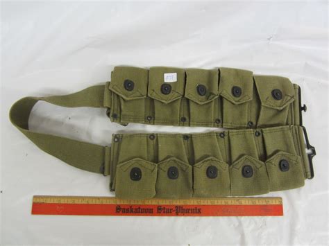 Green canvas military belt ammo pouches - Schmalz Auctions