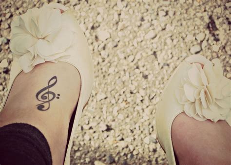 Treble & Bass Clef Foot Tattoo | Tattoos, Foot tattoos, Foot tattoo