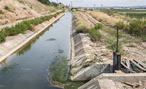 Irrigation canal | High-Quality Nature Stock Photos ~ Creative Market