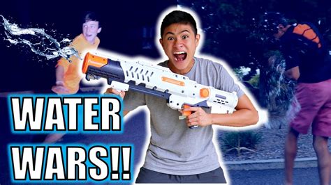 EPIC WATER GUN PRANK!! **WATER WARS** - YouTube