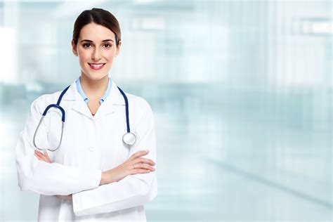 Medical physician doctor woman over blue clinic background. - Reliable ...