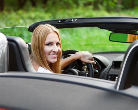 Blond Young Woman Driving a Sports Car Stock Photo - Image of summer ...