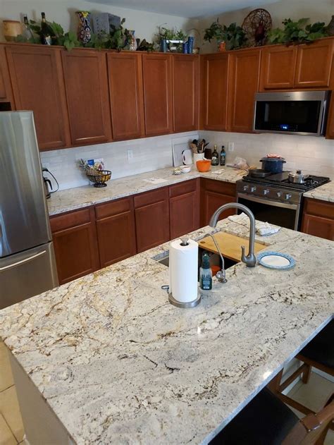 Pin by Deb Adams on white springs granite + fresh ivory backsplash ...