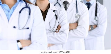 Group Modern Doctors Standing Team Arms Stock Photo 1535614721 ...