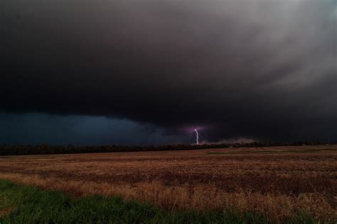 Cloud to ground Lightning Photograph by Tyler Schlitt | Fine Art America