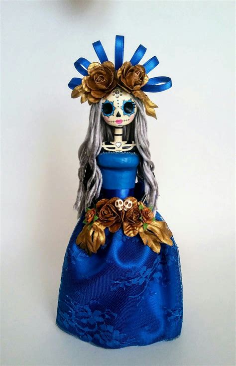 Blue and gold paper mache catrina. Day of the dead. Dia de muertos ...