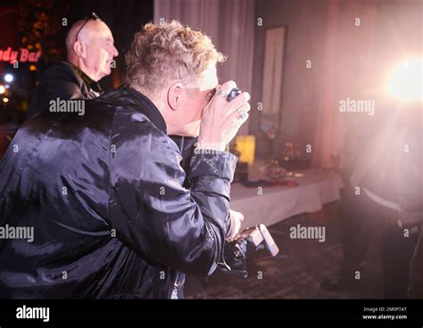 Berlin, Germany. 07th Dec, 2022. Matthias Schweighöfer photographs his ...