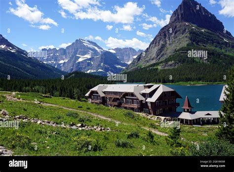 Mini Glacier Hotel on Swiftcurrent Lake, Grinnell Point Peak to the ...