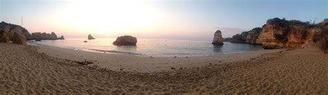 Watching the sunrise at Praia Dona Ana in Lagos, Algarve Coast/Portugal ...