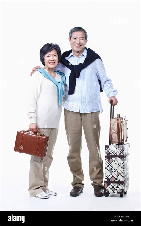 An old couple going on travel Stock Photo - Alamy