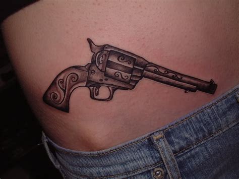 45 Amazing Gun Tattoo Designs