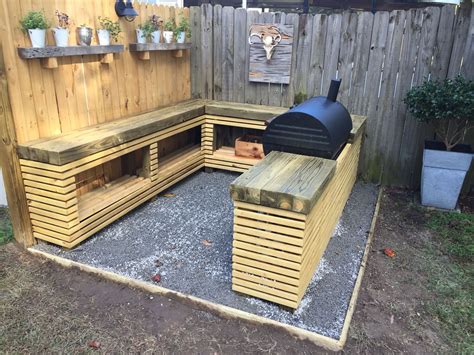 Outdoor grilling area. 4x4 countertops with 1x2 slatted lower cabinets ...