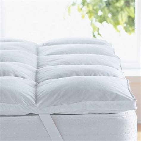 Up Your Sleep Game with These Cloud-Like Mattress Toppers