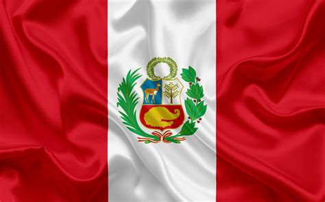 the flag of peru waving in the wind