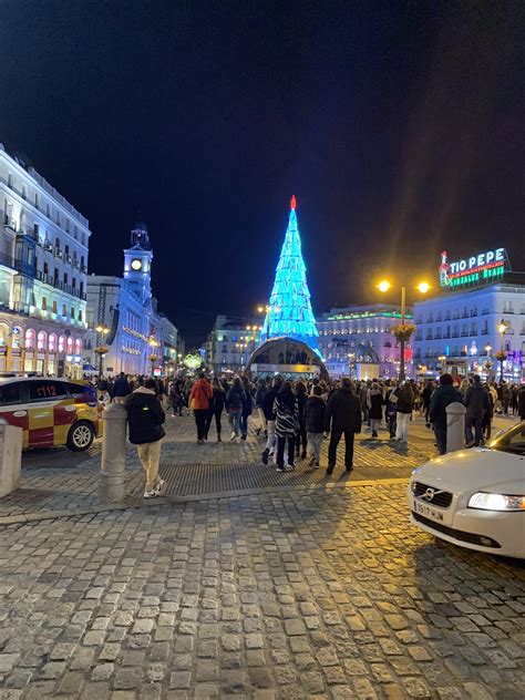 Puerta del Sol at night in Madrid, Spain : r/CityPorn