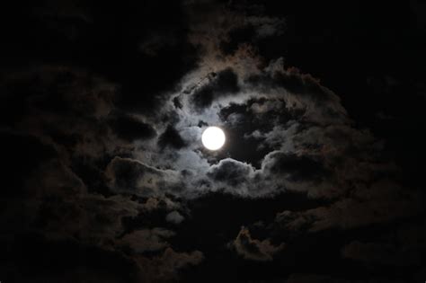 Premium Photo | Beautiful view of the full moon and clouds in the dark ...