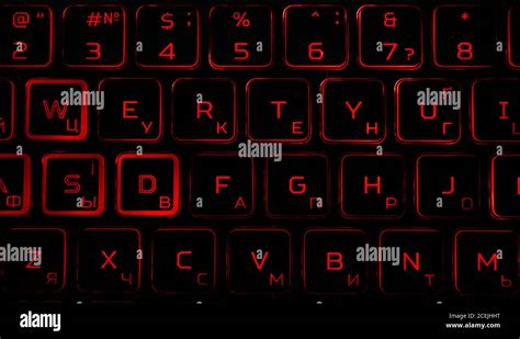 Black computer keyboard with red backlight in the dark Stock Photo - Alamy