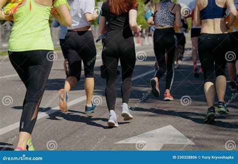 Crowd Running Marathon on Asphalt Road in City Editorial Photo - Image ...