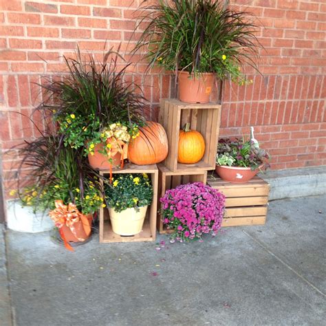 Wooden crates stacked with fall decorations. | Wooden crates, Winter ...