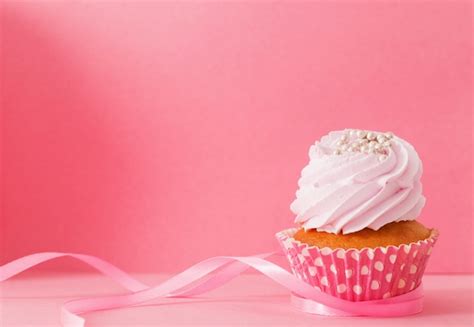 Premium Photo | Cupcake on pink background