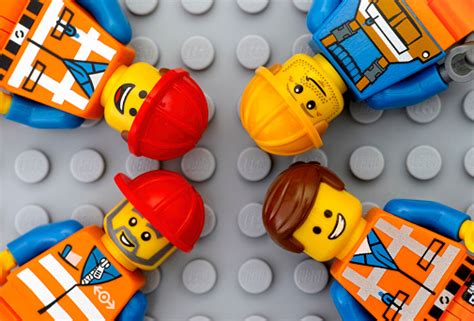 Four Lego Workers Minifigures Stock Photo - Download Image Now - iStock