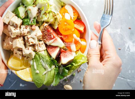 buddha bowl, vegan lunch, tofu fruit vegetables salad Stock Photo - Alamy