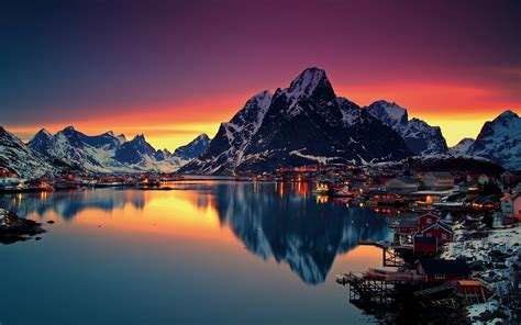 Online crop | snow capped mountain near body of water during golden ...