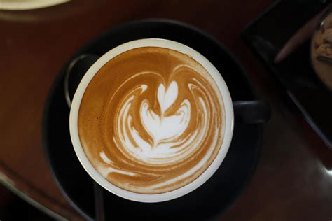 Coffee latte art in coffee shop 11044310 Stock Photo at Vecteezy