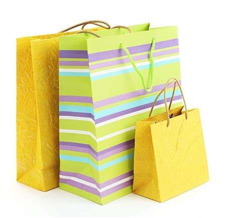 Premium Photo | Colorful shopping paper bags isolated on white