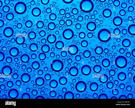 Blue color water bubble background surface macro view Stock Photo - Alamy