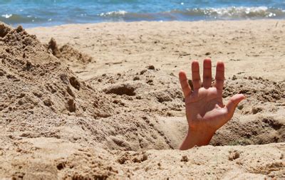 hidden dangers of dIgging in the sand | Hidden Outer Banks