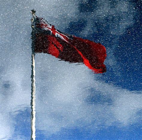 Reflextion of the Jersey(Channel Islands) flag at the St Helier Dock ...