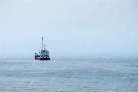 Premium Photo | Hopper dredger vessel in the sea