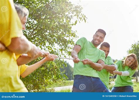 Two Teams in Tug-of-war Competition Stock Photo - Image of together ...