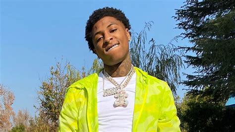 NBA Youngboy Is Wearing White T-Shirt And Green Overcoat Standing In ...