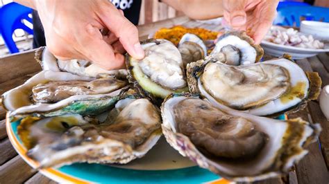 The Oyster King of Thailand - UNCLE TOM’S HUGE OYSTERS and Seafood at ...