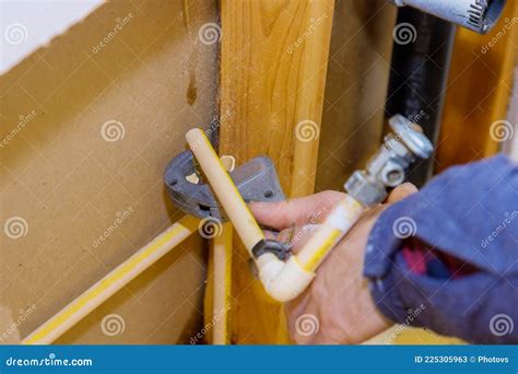 Repair Plumbing Line with a Leaking Pipe in a Bathroom Stock Image ...