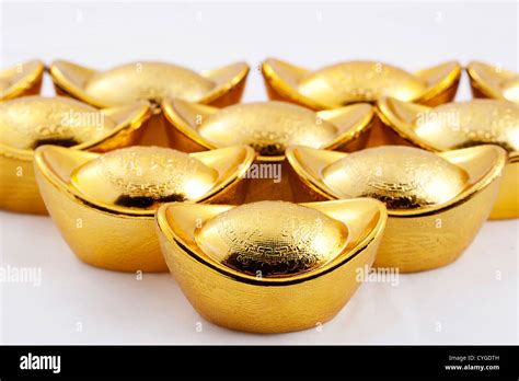 Chinese traditional currency gold yuanbao ingots Stock Photo - Alamy