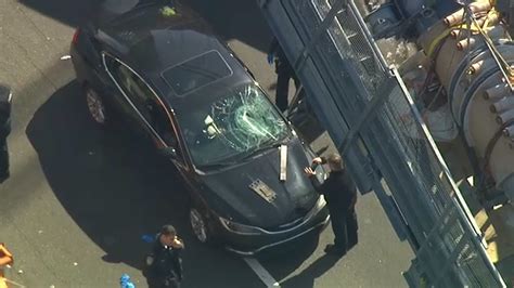 Driver hurt after debris smashes car windshield in westbound lanes of ...