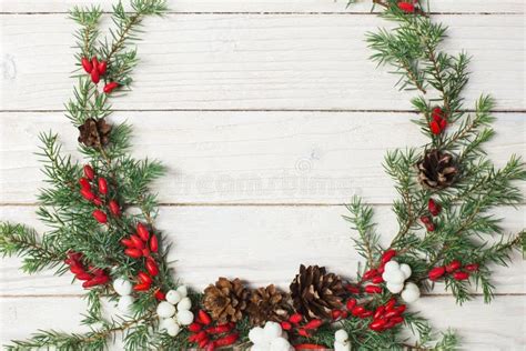 Christmas Wreath on Wooden Backdrop Stock Photo - Image of cone ...