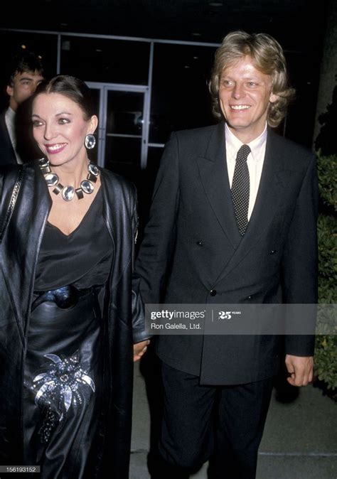 Actress Joan Collins and boyfriend Peter Holm attend the 'Scarface ...