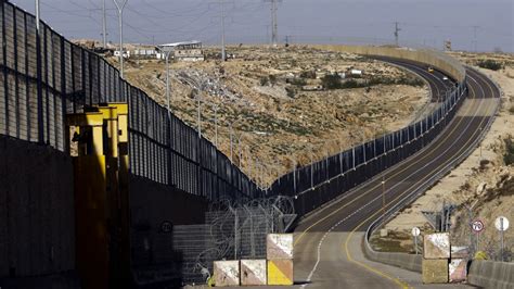 It's been 15 years since Israel's West Bank wall was declared illegal ...