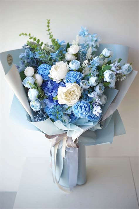 Pin by Emily on Flowers | Blue flower arrangements, Blue flowers ...