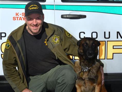 Heartbreaking photo shows Placer County deputy mourning the loss of his ...