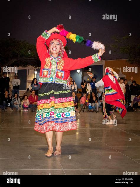 Dancers in colourful costumes performing traditional Huayno Cusqueño ...