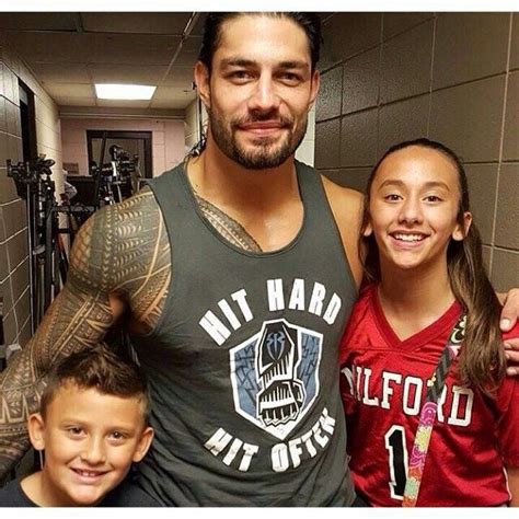 Roman Reigns with his niece and nephew