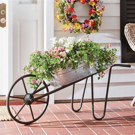 Metal Wheelbarrow | Wheelbarrow, Front yard decor, Country door