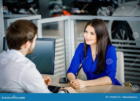 Final Negotiations before Sale Contract in Car Dealership. Stock Photo ...