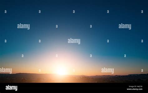 Clear sky sunset / sunrise Stock Photo - Alamy